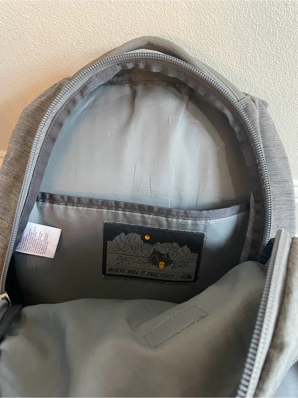 The North Face Gray Backpack with Blue Bungee Cord